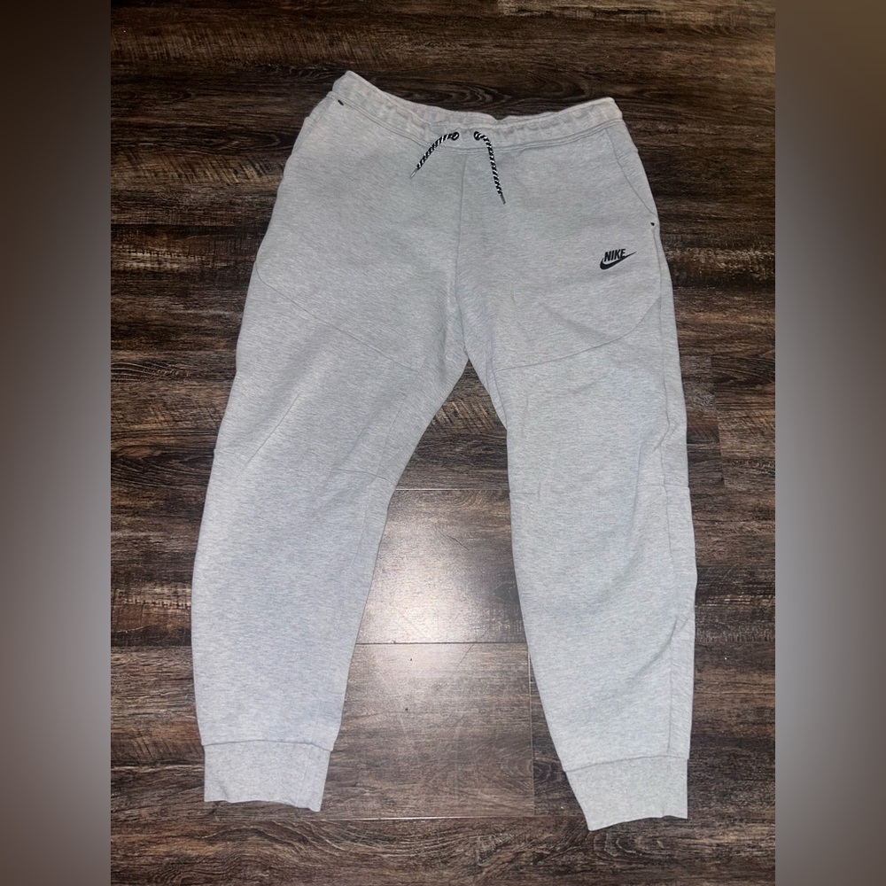 grey nike tech pants